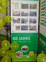 Banner mit historischen Bildern zum 60-jährigen Jubiläum der AWG Eisenach